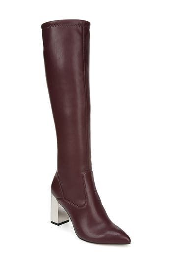 Streamlined, contemporary style defines a knee-high boot fashioned with a pointy toe and lofty block heel. 1 1/4" heel 15 1/2" shaft; 15 1/2" regular calf circumference 15 1/2" shaft; 16 1/2" wide calf circumference Back zip closure Synthetic upper and lining/rubber sole Imported Women's Shoes Wide Calf, Franco Sarto, Fashion Boots, Knee High Boots, Riding Boots, Contemporary Style, Knee High, Heeled Boots, Block Heels