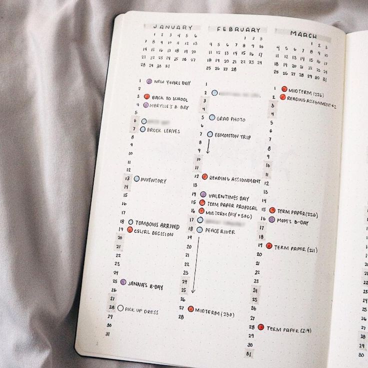 an open notebook with a calendar on it