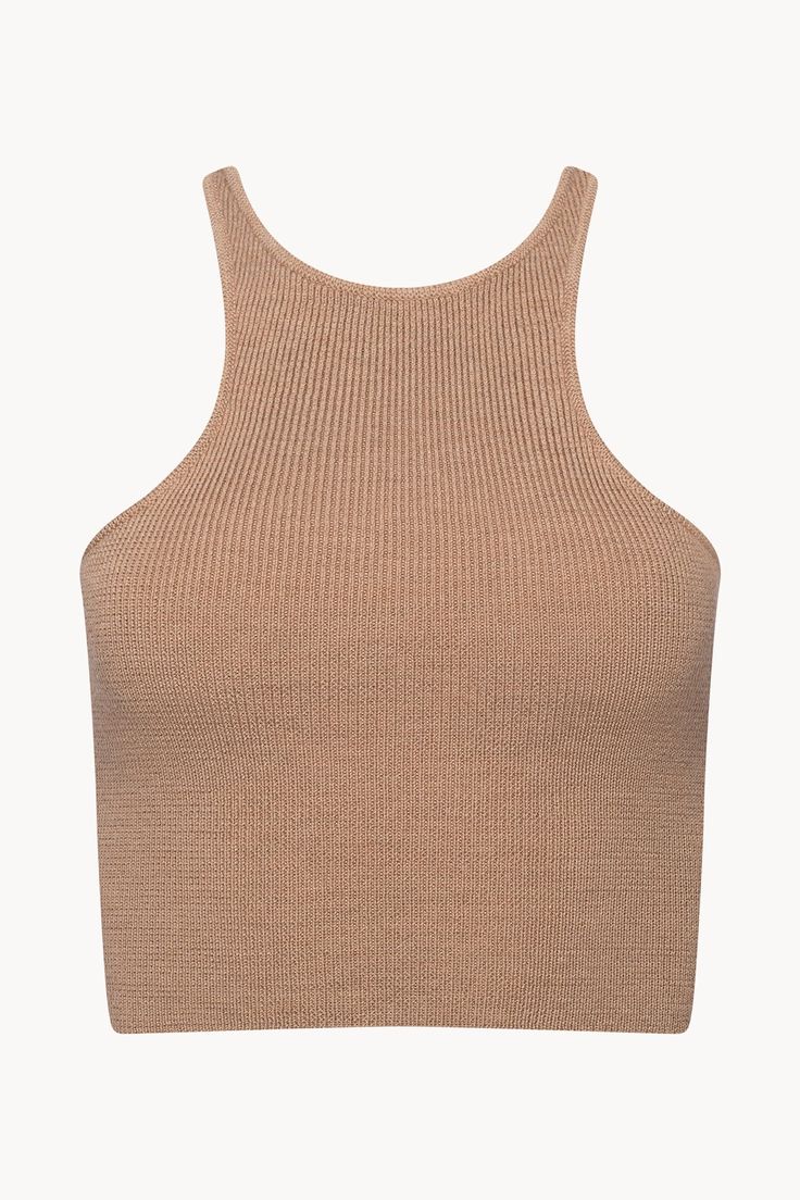 Cropped silhouette tank in merino wool with high crew neckline. Fitted Ribbed Merino Wool Top, Fine Knit High Neck Merino Wool Top, Fine Knit Merino Wool High Neck Top, Beige Merino Wool Top For Layering, High Neck Merino Wool Tops For Layering, Beige Fine Knit Merino Wool Tops, Stretch Merino Wool Tops In Solid Colors, Stretch Merino Wool Solid Top, Stretch Merino Wool Solid Color Tops