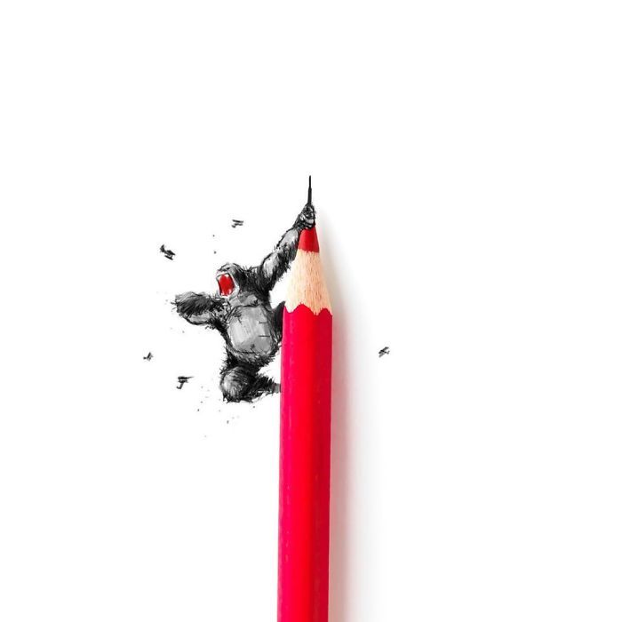 a red pencil with an animal drawn on it