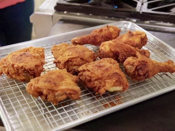 some fried food is on a metal tray