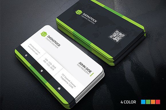 two black and white business cards with green accents