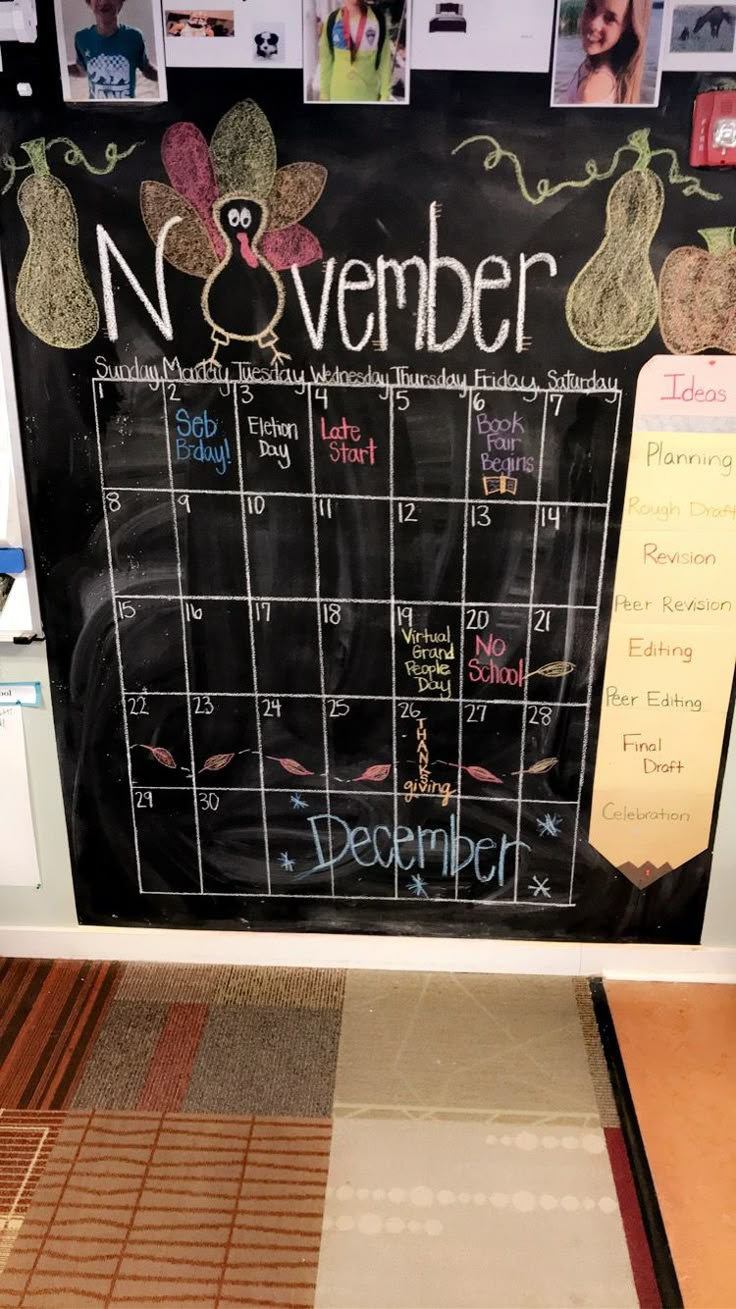 a chalk board with calendars on it