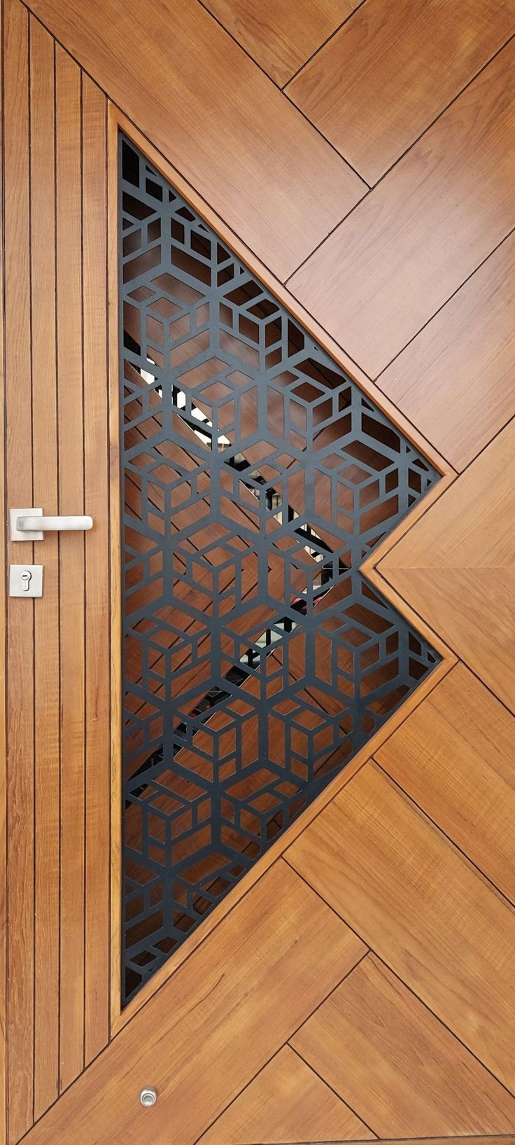 a wooden door with an intricate design on it