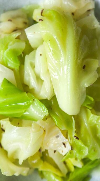 a close up view of some lettuce in a bowl