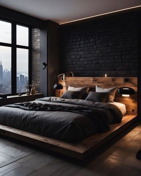 a large bed sitting in the middle of a bedroom next to a window with city lights on it