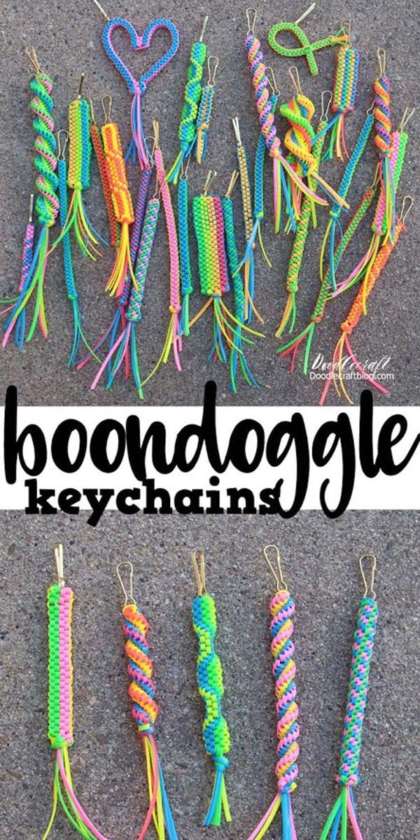 there are several different types of beads on the ground with words boooooggle keychains