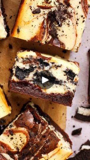 several brownies with white chocolate and oreo cookies on top, next to each other