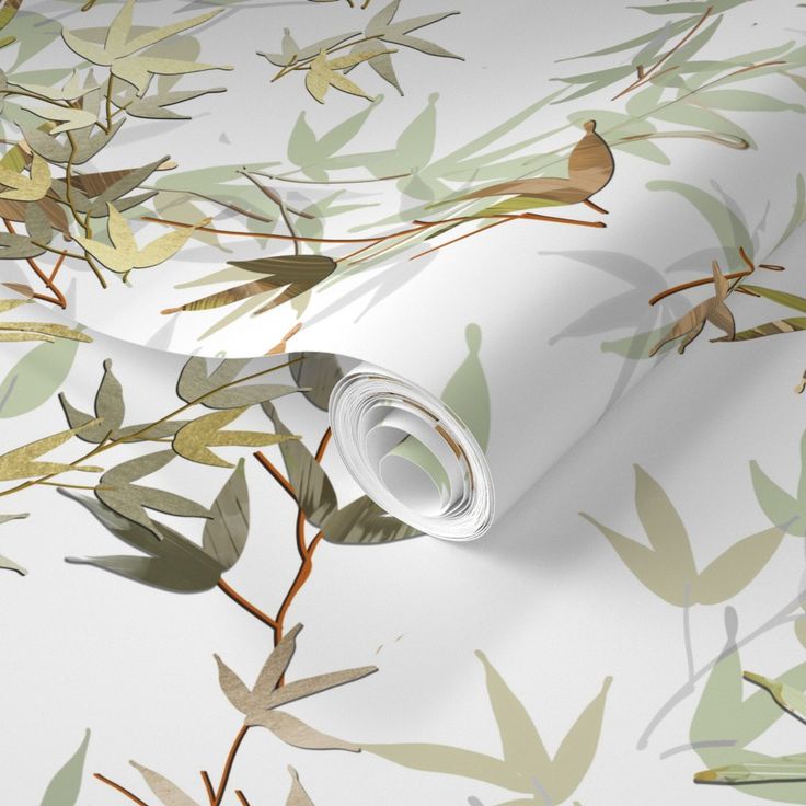 a white wallpaper with leaves on it