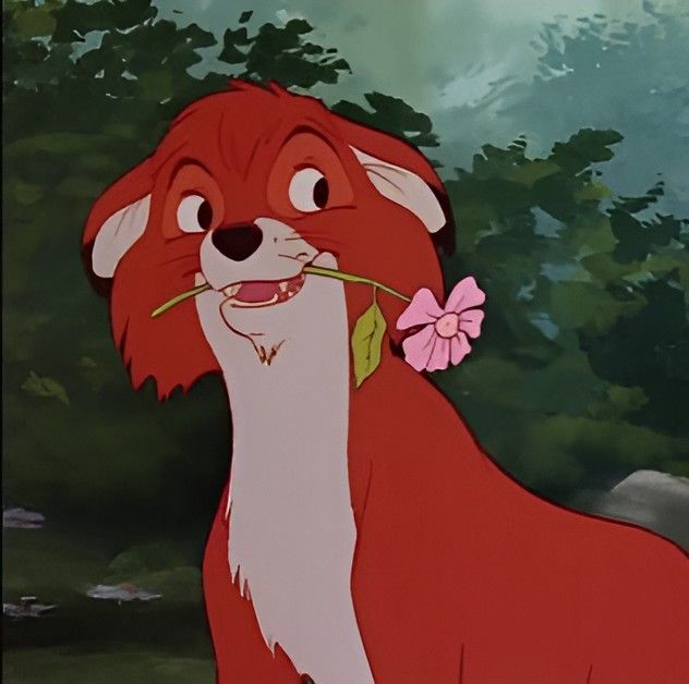 the fox and the hound is holding a flower in its mouth