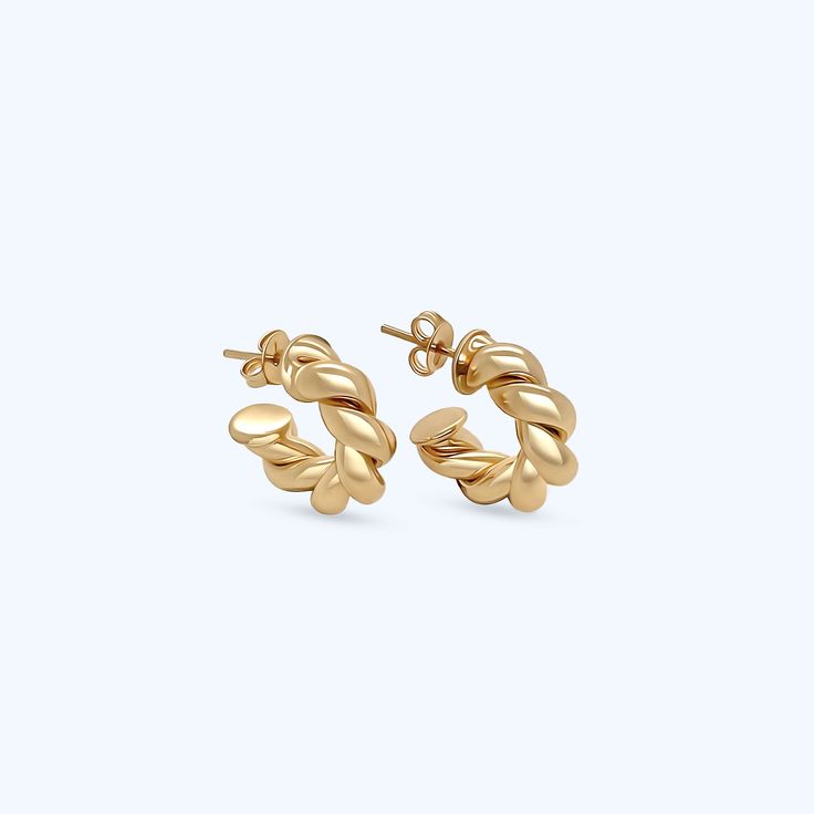 Named after our mother/grandmother, the Barbara twisted earrings are a modern take on a pair of her much loved hoops. Two intertwined polished gold strands create the classic circular shape. **Gold filled 14k gold over brass. *Waterproof. 3 Sizes Barbara diameter is 1.25" Mini Barbara diameter is .75" Huggie diameter is .50" *Waterproof but will be damaged by chlorine and other harsh liquids. **Our gold filled earrings have layers of 14k gold over brass. They have the look and color of solid gol Twisted 14k Yellow Gold Earrings, Modern Twist Yellow Gold Earrings With Polished Finish, Modern Twist Polished Yellow Gold Earrings, Twisted Yellow Gold Hoop Earrings, Tarnish Resistant, Twisted Gold Plated Yellow Gold Hoop Earrings, 14k Yellow Gold Twisted Earrings, Modern Twist Round Earrings, Elegant Twisted Yellow Gold Earrings, Modern Twist Tarnish Resistant Twisted Earrings