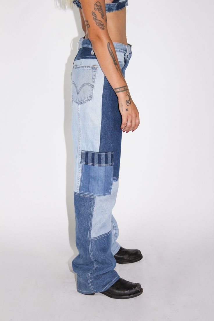 Upcycled Denim Cargo Pant Patchwork Style Side Cargo Pocketing w/ Snaps Zip Fly Indigo Denim Pants With Patch Pockets, Indigo Recycled Denim Bottoms With Pockets, Indigo Bottoms With Pockets In Recycled Denim, High Rise Jeans With Patch Pockets In Recycled Denim, Blue Recycled Denim Jeans With Patch Pockets, High Rise Blue Jeans With Patch Pockets, Recycled Denim Mid-rise Jeans With Patch Pockets, Indigo Denim Bottoms With Patch Pockets, Reworked Recycled Denim Blue Bottoms