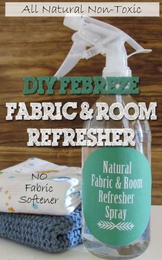 a bottle of fabric and room refresher sitting on top of a table