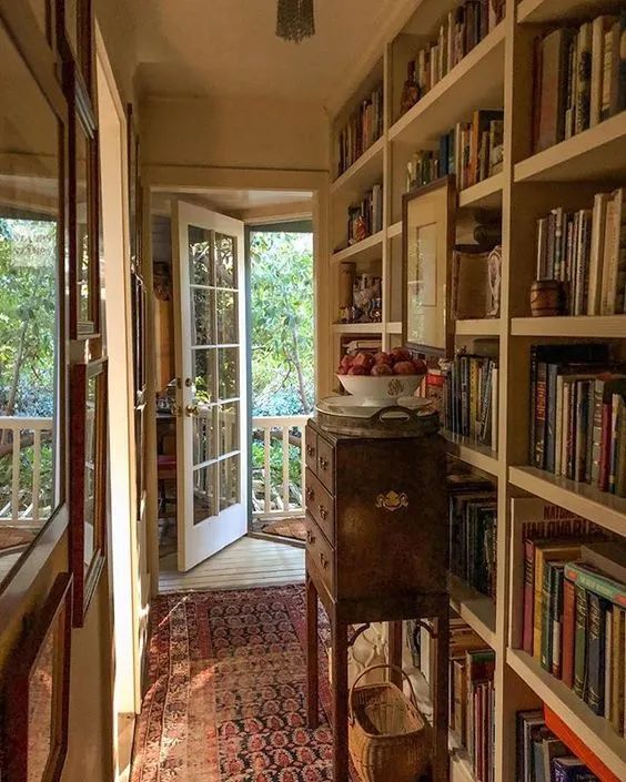 the hallway is full of books and many other things to see in the house,