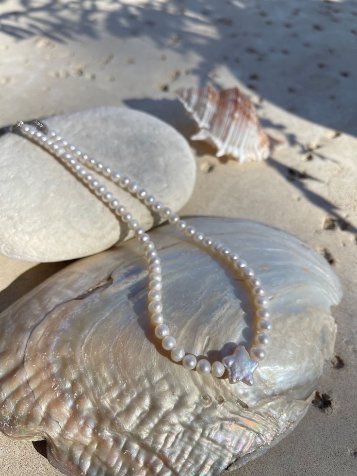 North Star Pearl Choker Necklace is the perfect choice for beach vacation or every day wear. This pearl necklace is made using natural water fresh pearl for both the star pendant and necklace for understated elegance. Available with North Star earrings, our signature beach accessories are made to match your favorite Coco De Chom designs. Our accessories are handmade using eco-friendly materials. A unique necklace for your vacation or the bohemian bridesmaids.* Size: 0.3cm breads* Measures approx Pearl Beach Necklace, Beach Pearl Necklace, Star Pearl Necklace, Cute Yellow Dresses, Bohemian Bridesmaid, Handmade Pearl Jewelry, Star Pearl, Antlers Decor, Sea Mermaid