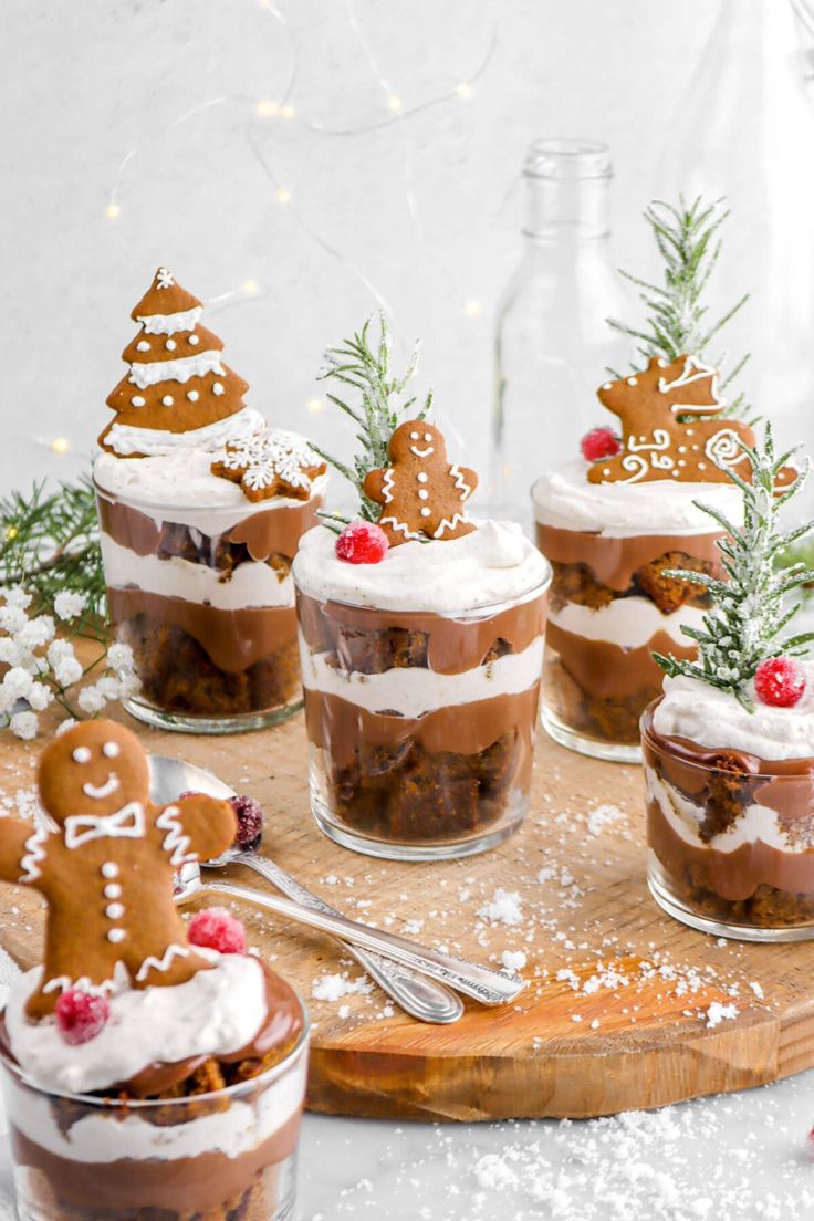 gingerbread desserts in glass jars decorated with christmas decorations