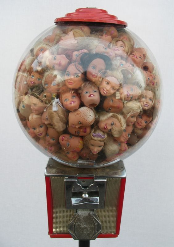 a gum ball filled with lots of dolls