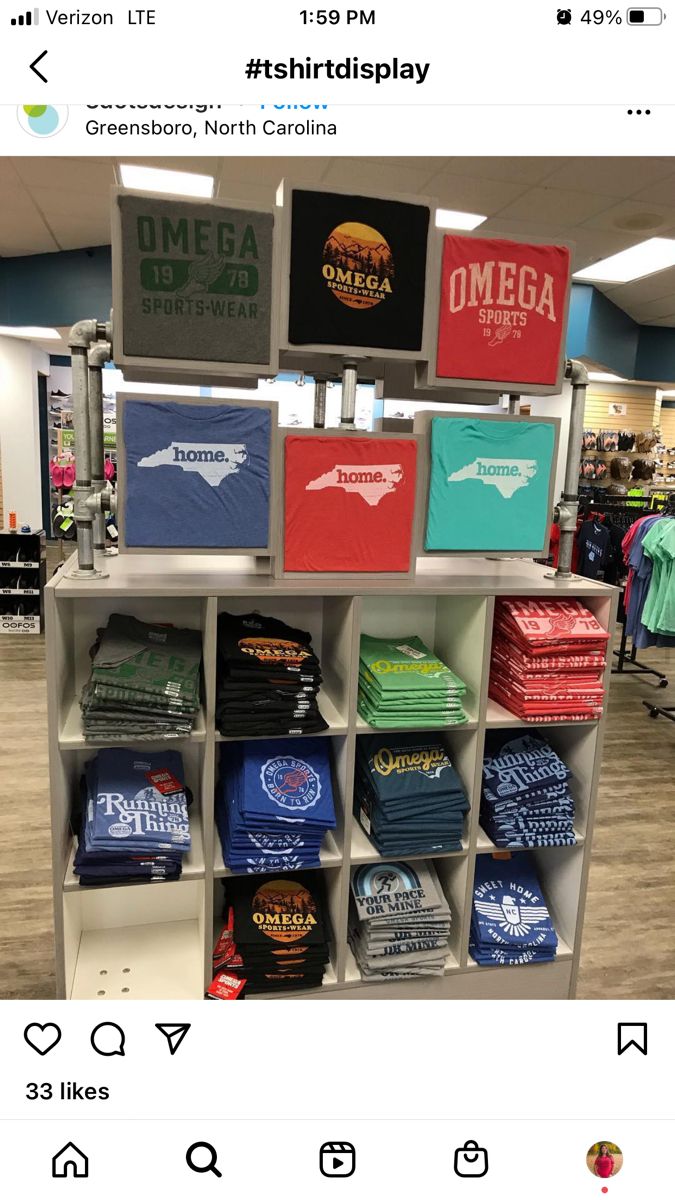 t - shirts are on display in the store