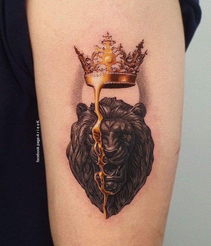 a lion with a crown on it's head is depicted in this tattoo design