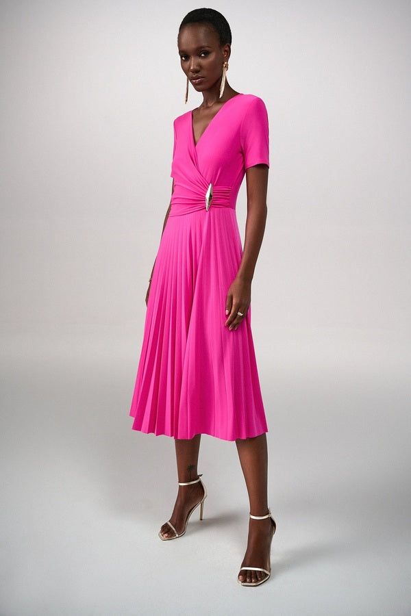 True refinement starts with this classy look from Joseph Ribkoff. Designed in a stretchy fabric that conforms to your figure, the style's surplice neckline is a graceful detail. A voluminous, pleated skirt gives the look a playful touch, making this the ideal outfit for days or evenings. 96% Polyester, -4% Spandex No pockets No zipper Cold water hand wash or hand wash cycle Do not bleach Hang to dry Do not tumble dry Low iron Do not dry clean Wash garment inside out Wrap Dress Styles, Animal Print Tote Bags, Joseph Ribkoff Dresses, Staple Wardrobe, Jeweled Headband, Midi Dress Style, Leopard Print Scarf, Knit Wrap, Leggings Sale