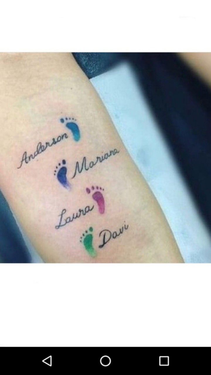 a person with a tattoo on their arm that says, i love you mom and son