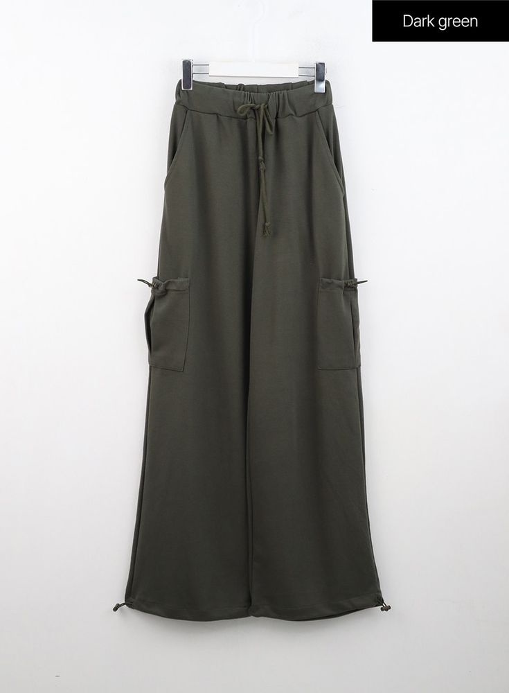 straight-fit-string-cargo-pants-in310 / Dark green Trendy Green Baggy Wide Leg Pants, Casual Wide Leg Cargo Pants With Drawstring, Casual Wide Leg Cotton Pants With Drawstring, Trendy Green Relaxed Fit Wide Leg Pants, Trendy Green Wide Leg Pants With Relaxed Fit, Trendy Green Straight Parachute Pants, Trendy Baggy Green Wide Leg Pants, Green Utility Style Wide Leg Pants With Pockets, Green Utility Style Wide Leg Pants