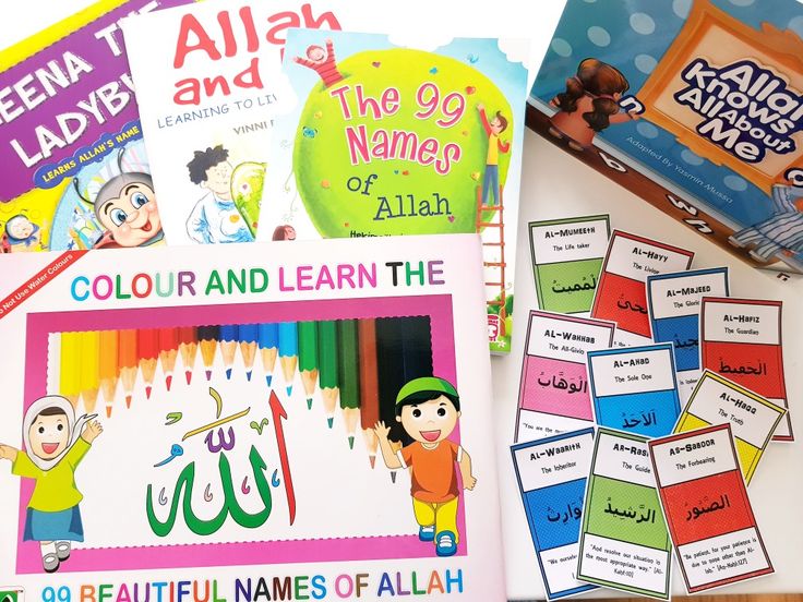 several children's books on a table with arabic and english words in the pages