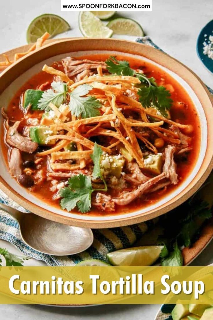 a bowl filled with tortilla soup and garnished with cilantro