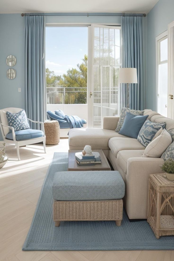 a living room filled with furniture and blue walls