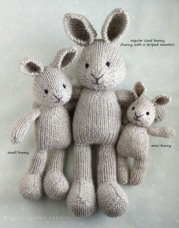 three knitted stuffed animals sitting next to each other