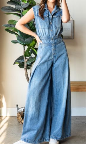 Step into effortless style with the Devin Denim Jumpsuit, featuring a medium-washed denim finish and a chic, sleeveless design. The button-down front and collared neck add a touch of sophistication, while the big cargo chest pocket and back pockets offer practical flair. With a ruched waist back and extra-wide pant legs, this jumpsuit combines comfort and fashion for a versatile, standout look. Measurements (based on flat lay): Small: Chest 17" Waist 14" Hip 21" Length 59" Inseam 31" Medium: Che Skirt Jumper, Free Dresses, Washed Denim, Wide Pants, Denim Jumpsuit, Small Chest, Wrinkle Free, Hoodie Top, Denim Wash