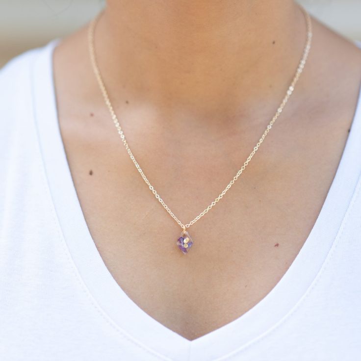 Handcrafted with dried lilac flowers, this Flower Pendant Necklace is a gorgeous keepsake gift that encapsulates the beauty of Tasmania's nature.  The Lilac pressed flower necklace has an adjustable chain and is elegant and dainty - perfect for everyday wear, complete with a dainty resin flower pendant. -14k Gold Plated or Silver Plated -Tarnish Resistant Chain (nickel free). -45cm Length 2.0mm Width Oval Link Chain -Adjustable and extendable  -Handmade in Tasmania using locally grown dried flowers *To preserve your botanical jewellery please avoid wearing in water and store out of direct sunlight to maintain the colour quality of the flowers.* Follow our Instagram @littleflowerearrings for more about our brand, The Little Flower Handmade and all our resin flower jewelry! Delicate Lavender Gemstone Jewelry, Delicate Amethyst Jewelry For Gifts, Dainty Purple Jewelry As A Gift For Her, Purple 14k Gold Filled Jewelry As A Gift, Purple 14k Gold Filled Jewelry Gift, Delicate Lavender Necklace For Gift, Lavender Jewelry With Pressed Flowers For Gifts, Lavender Dainty Birthstone Jewelry, Dainty Lavender Birthstone Jewelry