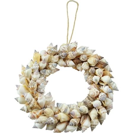 a wreath with seashells hanging from it