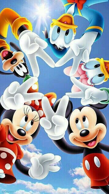 mickey mouse and friends flying in the sky