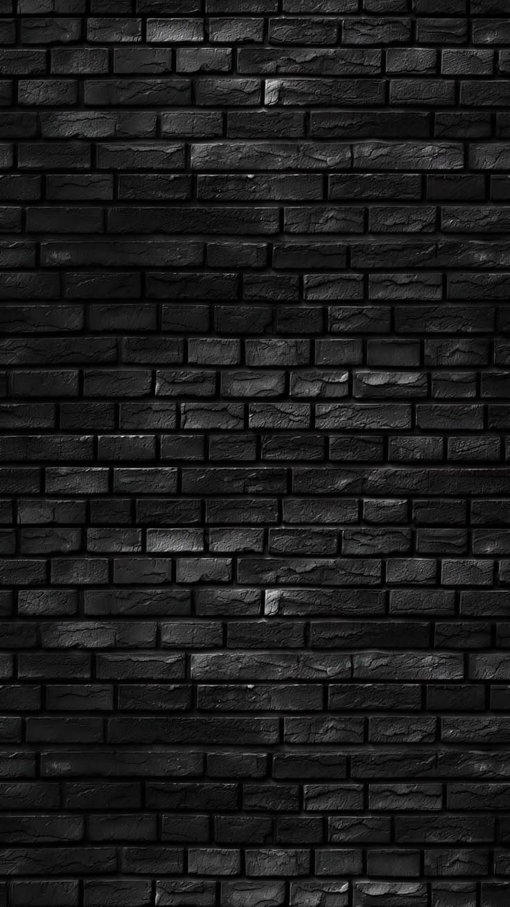 a black brick wall that is very dark