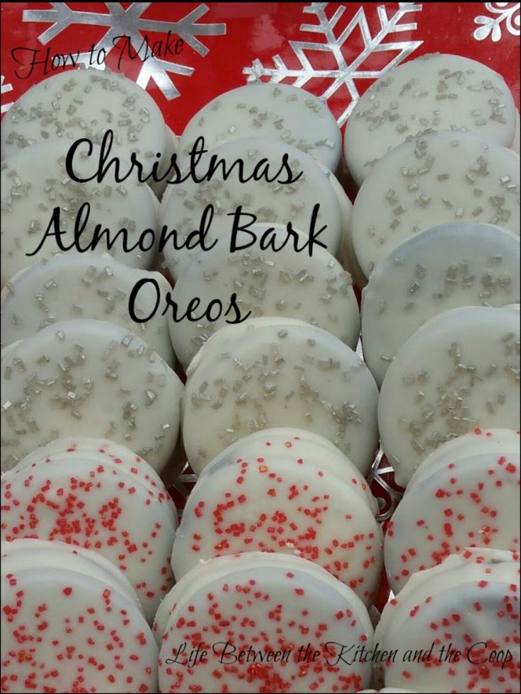 christmas almond bark oreos with red and white sprinkles on them in a box