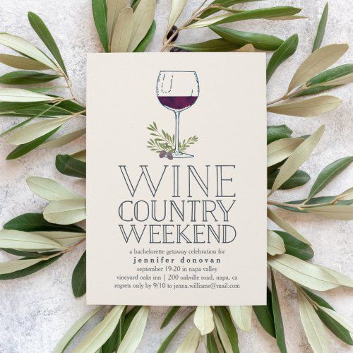 the wine country weekend flyer is surrounded by green leaves and olives, with a glass of red wine on top