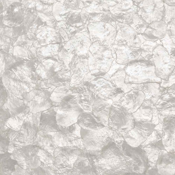 an image of white marble textured paper with silver foil on it's surface