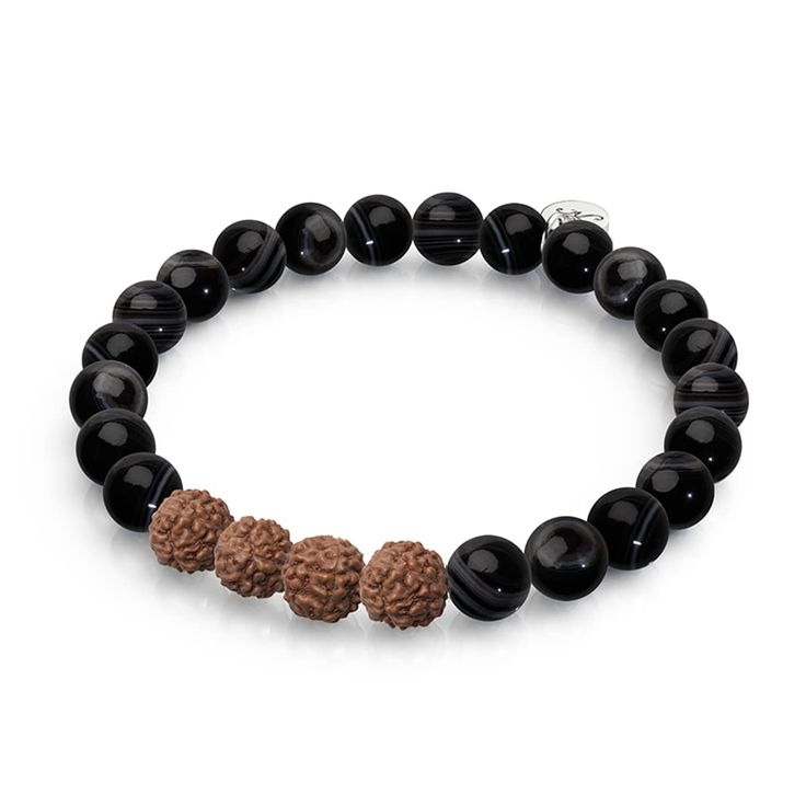 Discover the spiritual power of Rudraksha beads with this elegant Feng Shui Mala Bracelet from NOGU. Featuring a combination of Black Line Agate and Rudraksha beads, this unisex bracelet is set on a silver-finished stainless steel base and strung on a clear elastic cord. The Rudraksha beads, revered for their connection to pure consciousness and the source of existence, add a touch of spirituality to your everyday look. The beads measure 8mm in size, and the cord has a circumference of 7.8 inche Pure Consciousness, Rudraksha Bracelet, Rudraksha Mala, Rudraksha Beads, Mermaid Glass, Black Everything, La Source, Mala Bracelet, All Black Everything