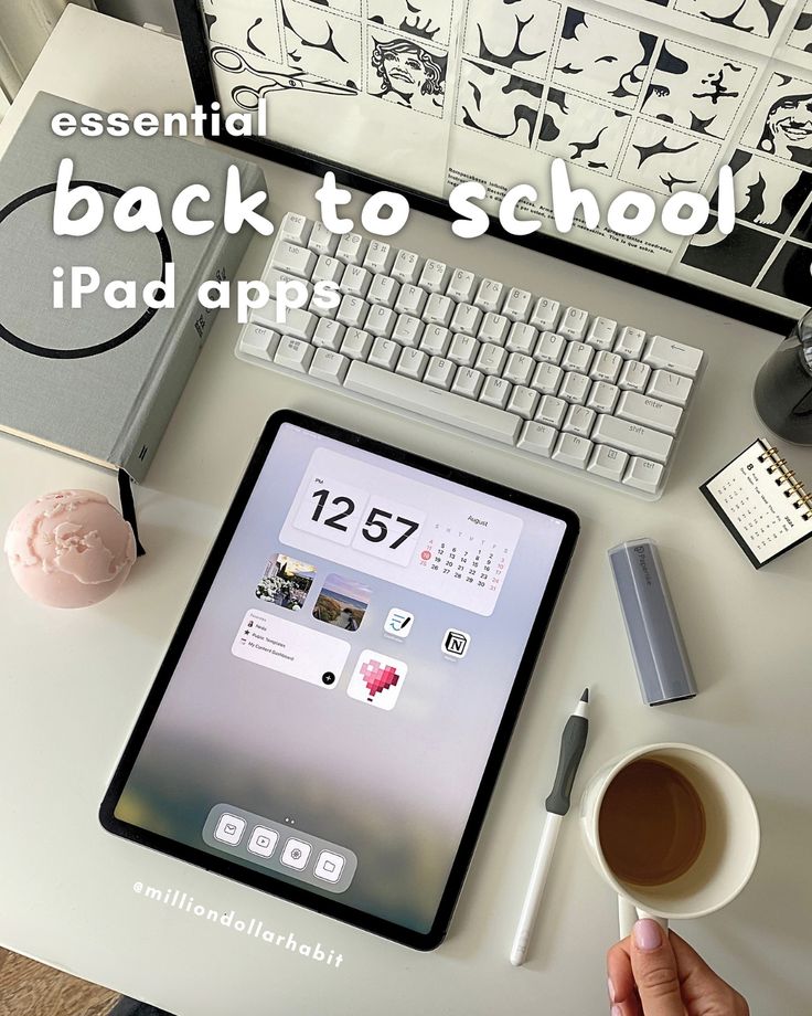 an ipad sitting on top of a desk next to a cup of coffee and keyboard