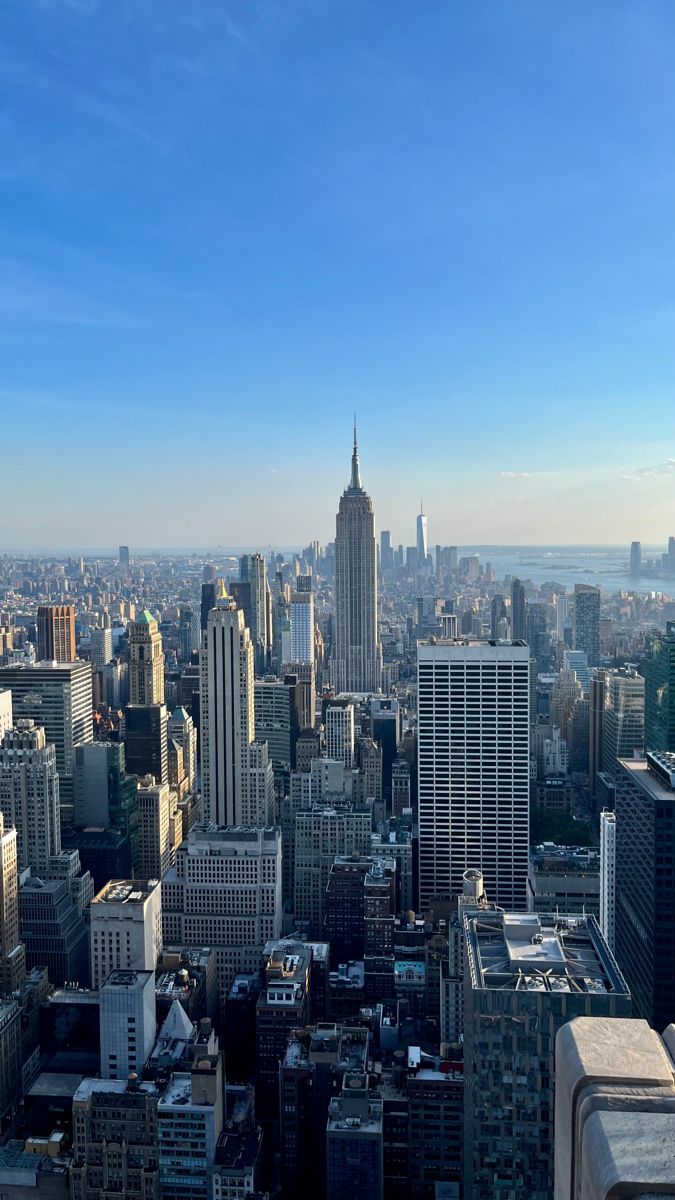 an aerial view of new york city with skyscrapers