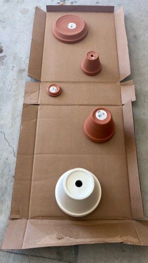 the table is covered with brown paper and white dishes