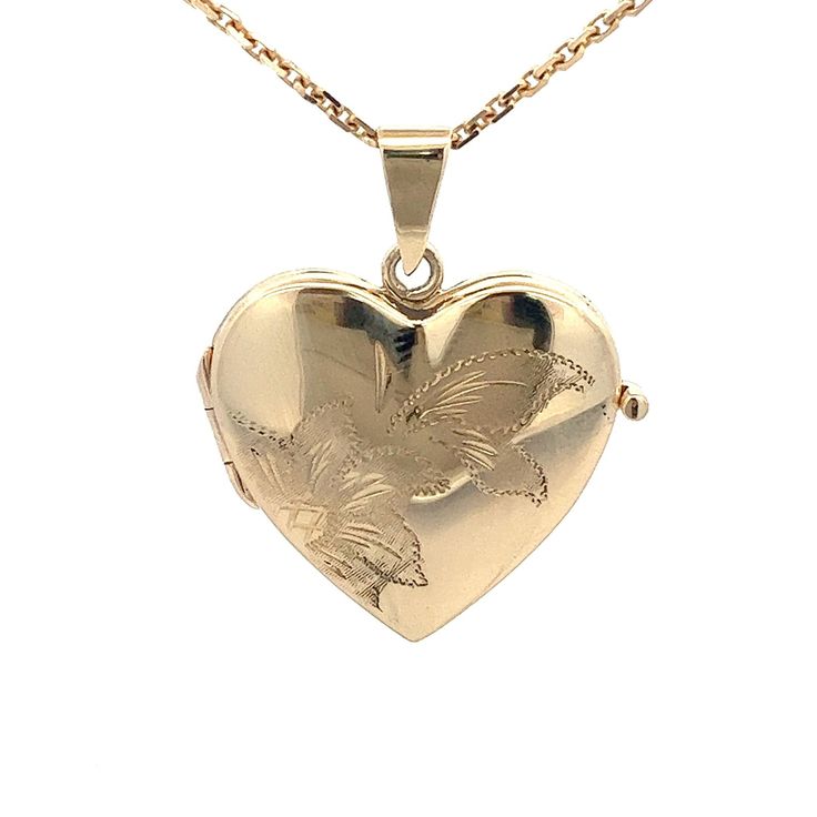 "Solid 14k Yellow Gold Picture, Photo Locket ~ Heart Shape ~ Floral Flowers ~ Large Engravable Charm, Pendant Made in Italy ~ BE25 This yellow gold locket features a simple stylized engraved floral design on the front. The back of the heart is polished. Inside there is room for a picture on either side. This is a thick heavy weight, and will not dent if engraved.  The locket closes tightly as it should. This sweet locket pendant would be wonderful for a wife, daughter, new mom, grandmother, sweetheart or anyone who wants to have something to remember a loved one by. Metal Content: Solid 14K Gold Chain is NOT included Pendant Measurements Length including bail:  1 3/16\" (30mm) Width:  1 1/32\" (26mm) Bail opening: 7mm x 2mm Weight: 6.24 Grams Stamps: 14k Italy MNC Condition:  New  Each pie Traditional Heart-shaped Jewelry For Weddings, Traditional Heart Jewelry For Wedding, Traditional Heart-shaped Wedding Jewelry, Traditional Yellow Gold Keepsake Jewelry, Traditional Yellow Gold Jewelry For Keepsake, Antique Yellow Gold Heart Cut Jewelry, Yellow Gold Jewelry For Valentine's Day Wedding, Yellow Gold Jewelry For Wedding On Valentine's Day, Heirloom Heart-shaped Yellow Gold Jewelry