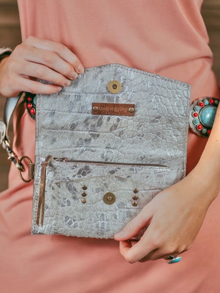 Girl, yes you! You need this wristlet! The most gorgeous silver metallic wallet. Genuine leather *this wristlet is authentic with real genuine leather Need This, Metallic Silver, Genuine Leather, Jordan, Wallet, Leather, Silver