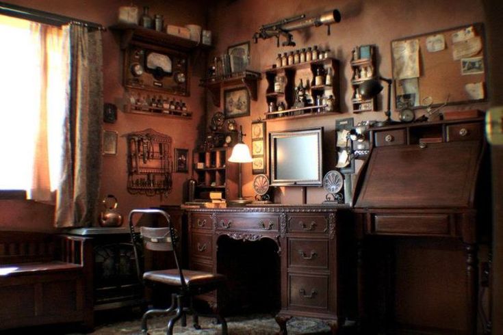 an old fashioned desk and chair in a room