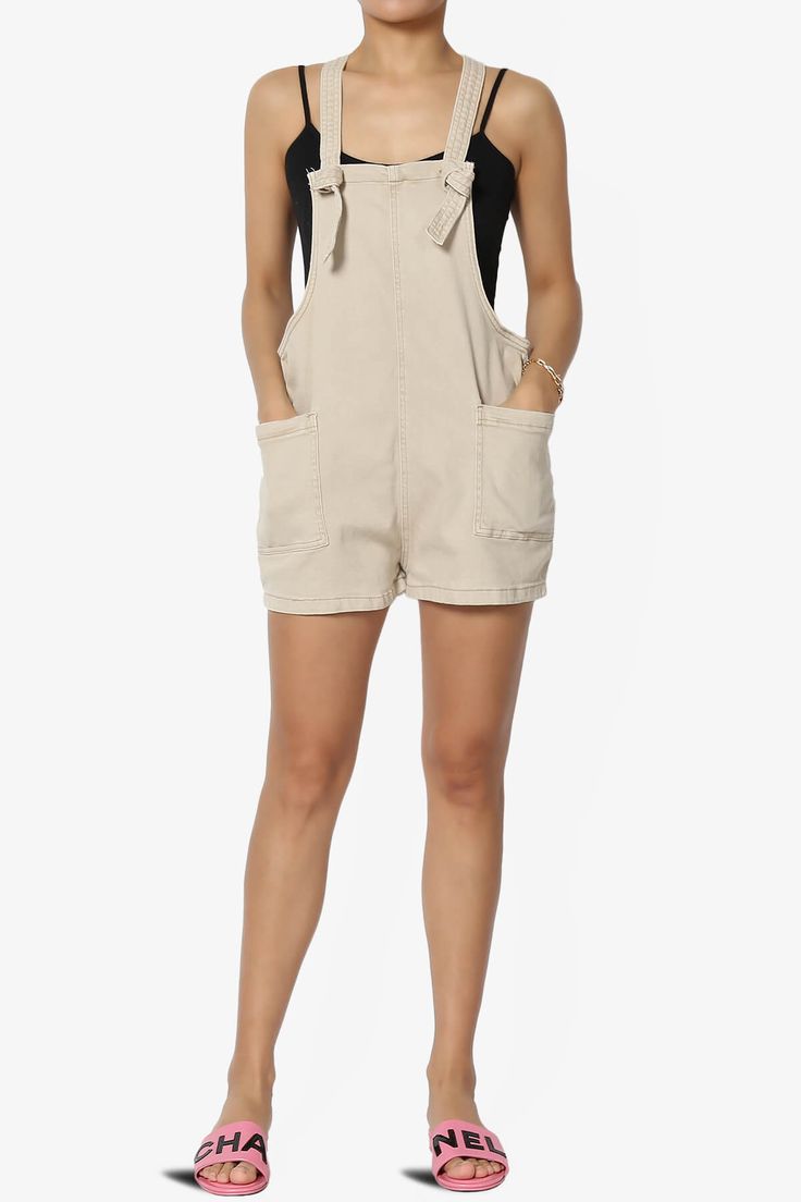 Embrace effortless style with our Washed Denim Shortall, featuring adjustable straps for a perfect fit.Ideal for casual outings, this relaxed-fit short overall pairs classic charm with modern streetwear vibes.Crafted from a soft cotton blend twill, it offers comfort for all seasons. Equipped with handy pockets, it's perfect for lounging or a trendy street look short playsuit.Pair with a simple tee and sneakers for an edgy remix suitable for everyday casuals, weekend jaunts, or vacation lounging. Casual Short Overalls With Pockets, Spring Shortalls Overall For Day Out, Spring Shortalls For Day Out, Short Cotton Overalls With Pockets, Cotton Overalls With Pockets In Short Length, Cotton Short Overalls With Pockets, Trendy Relaxed Fit Overalls For Day Out, Casual Shortalls Overalls For Day Out, Casual Shortalls With Side Pockets