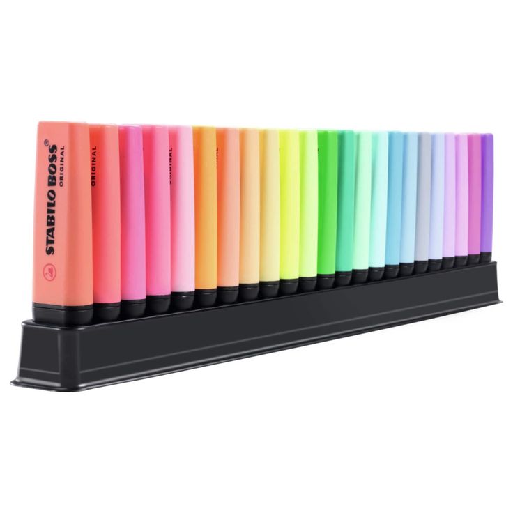 a row of multicolored pens sitting on top of a black stand