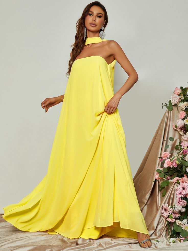 Product Code: FSWD0847 Embellishment: Chiffon Fabric: 100% Polyester Back Style: Zipper Up Fully Lined: Yes Built-in Bra: No Available Color: Yellow Stretch: Moderate Fits true to size Imported Model Information: Height: 5' 2" Bust: 33.5'' Waist: 24“ Hips: 35.5” wearing US size Small Cocktail Georgette Maxi Dress, Yellow Sleeveless Chiffon Dress For Wedding, Elegant Georgette Maxi Dress For Beach, Elegant Yellow Floor-length Chiffon Dress, Flowy Georgette Chiffon Dress For Bridesmaid, Sleeveless Georgette Maxi Dress For Cocktail, Yellow Flowy Sleeveless Chiffon Dress, Flowy Sleeveless Yellow Chiffon Dress, Flowy Silk Chiffon Floor-length Dress