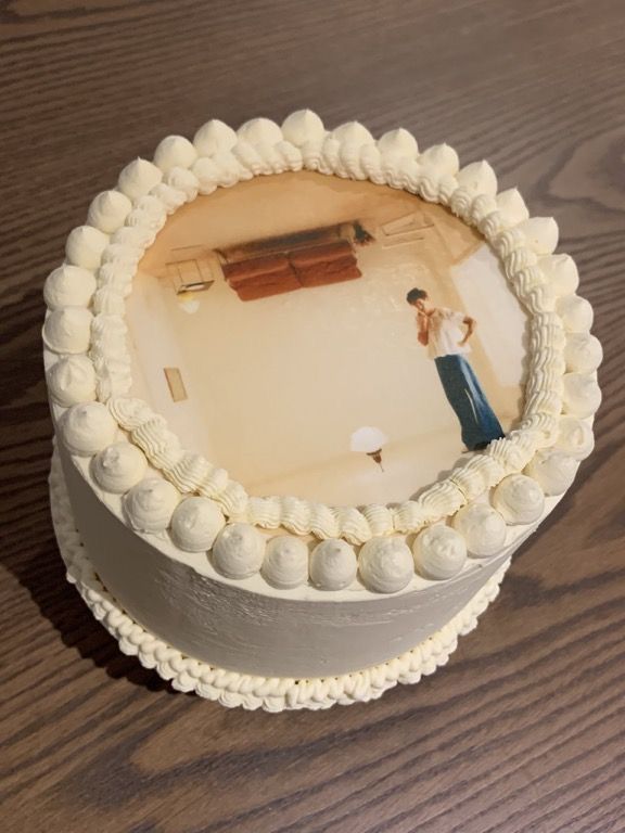 there is a cake with a photo on it