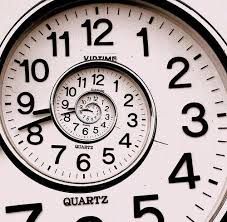 a large white clock with black numbers on it